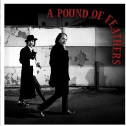 The Black Crowes - A Pound of Feathers (Red + Black Splattered Vinyl)